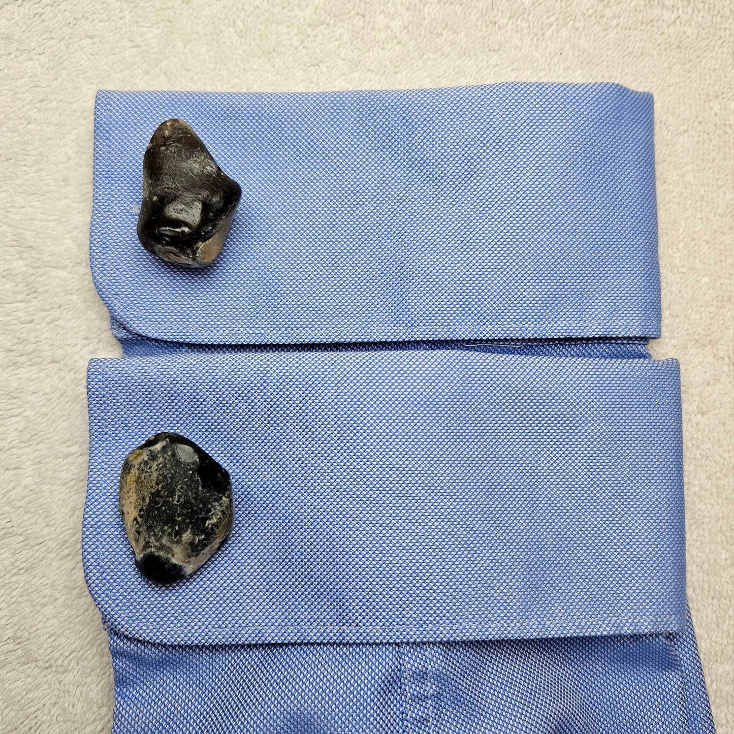 Image shows Brighton Rocks! Cufflinks designed by barnardandjestico . Stylish Cufflinks of natural polished stone ; from handmade process at my studio in Brighton Sussex England. For Menswear to show individual flair . Bold-sized ( 2-to-4cm ) natural shaped stones specialist-waxed and polished , then set on steel-studs . Homemade artisan methods of natural environmental materials