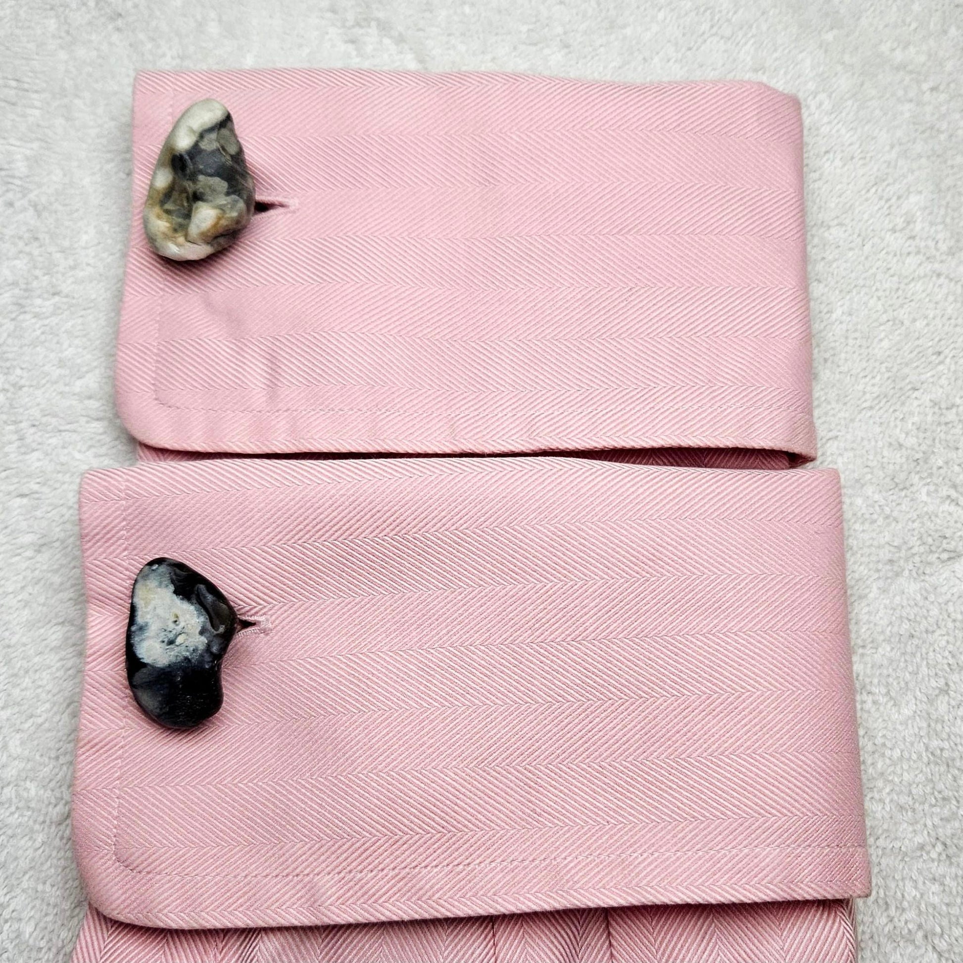 Image shows Brighton Rocks! Cufflinks designed by barnardandjestico . Stylish Cufflinks of natural polished stone ; from handmade process at my studio in Brighton Sussex England. For Menswear to show individual flair . Bold-sized ( 2-to-4cm ) natural shaped stones specialist-waxed and polished , then set on steel-studs . Homemade artisan methods of natural environmental materials