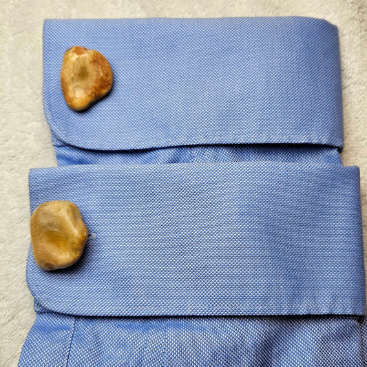 Image shows Brighton Rocks! Cufflinks designed by barnardandjestico . Stylish Cufflinks of natural polished stone ; from handmade process at my studio in Brighton Sussex England. For Menswear to show individual flair . Bold-sized ( 2-to-4cm ) natural shaped stones specialist-waxed and polished , then set on steel-studs . Homemade artisan methods of natural environmental materials