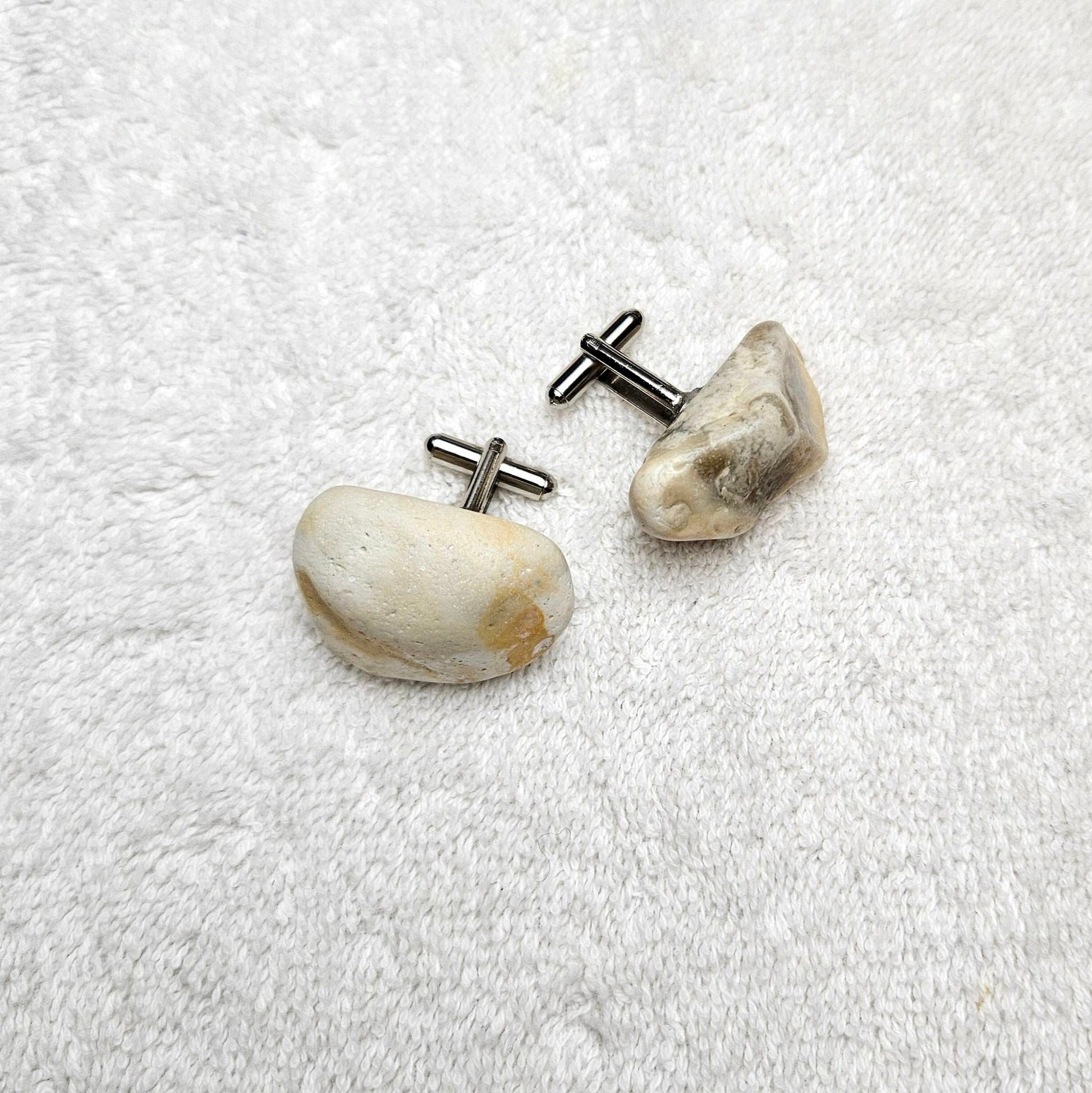 Image shows Brighton Rocks! Cufflinks designed by barnardandjestico . Stylish Cufflinks of natural polished stone ; from handmade process at my studio in Brighton Sussex England. For Menswear to show individual flair . Bold-sized ( 2-to-4cm ) natural shaped stones specialist-waxed and polished , then set on steel-studs . Homemade artisan methods of natural environmental  materials