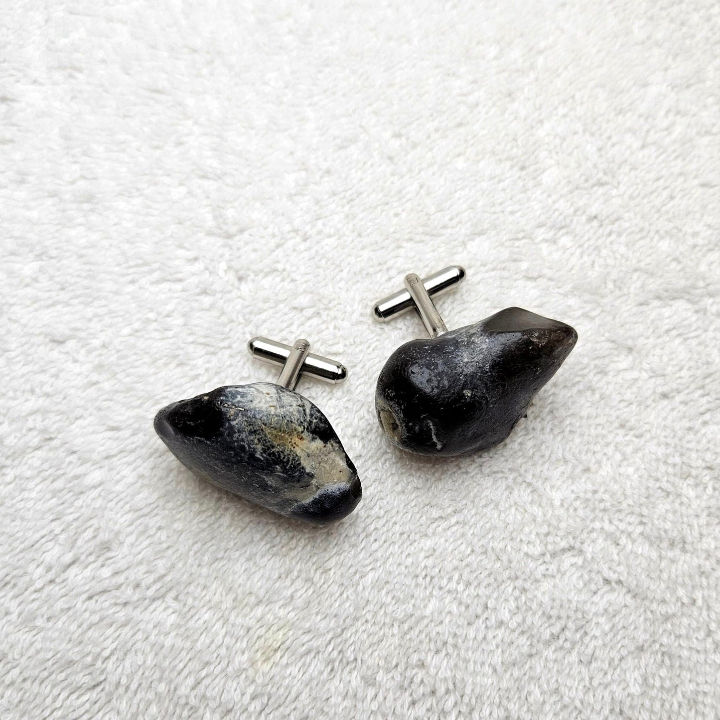 Image shows Brighton Rocks! Cufflinks designed by barnardandjestico . Stylish Cufflinks of natural polished stone ; from handmade process at my studio in Brighton Sussex England. For Menswear to show individual flair . Bold-sized ( 2-to-4cm ) natural shaped stones specialist-waxed and polished , then set on steel-studs . Homemade artisan methods of natural environmental materials